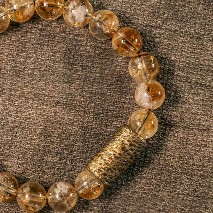 Bransoletka ochronna z naturalnego kryształu cytrynu i mosiądzu z Buddha Stones