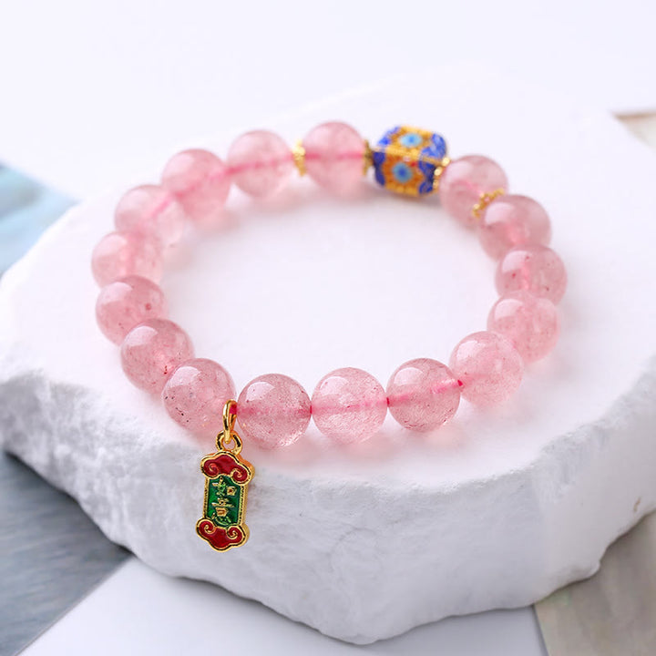 Bransoletka z Buddha Stones, kwarcem truskawkowym i pozytywnym urokiem Ruyi