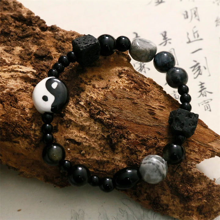 Bransoletka ochronna z Buddha Stones z czarnego onyksu i koralikami z jaspisu Picasso Yin Yang