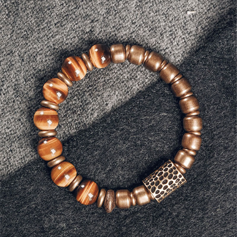 Bransoletka ochronna z Buddha Stones, kamieniami tygrysimi i miedzią