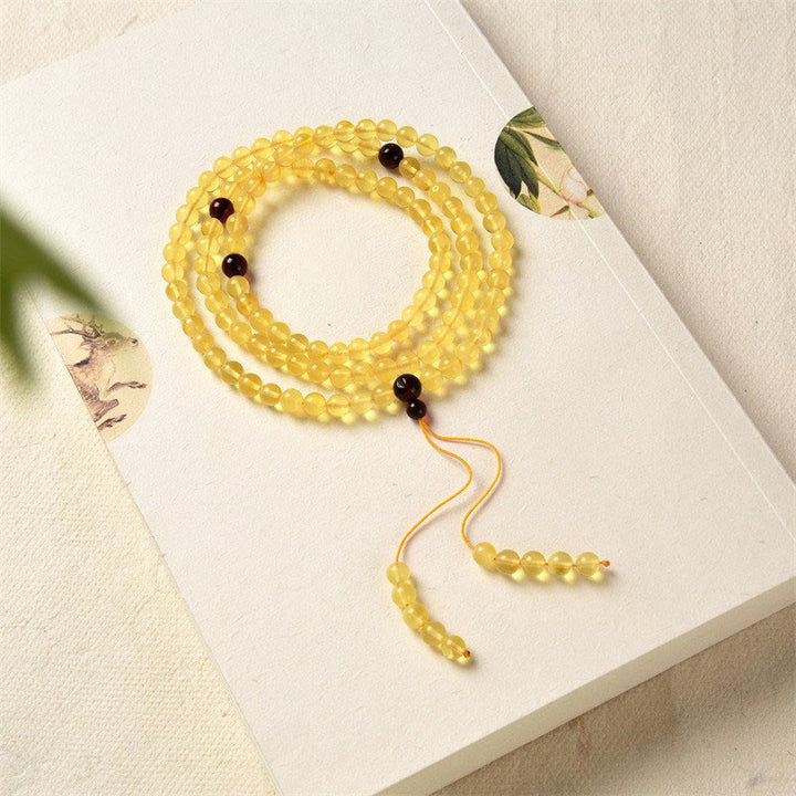 Buddha Stones 108 Mala Beads Naturalny Bursztyn Przezroczysta Bransoletka Antystresowa