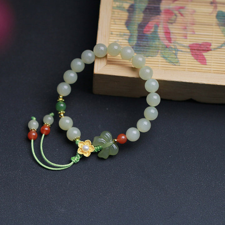 Bransoletka z Buddha Stones 925 ze srebra próby 925 z kwiatem szczęścia i motylem