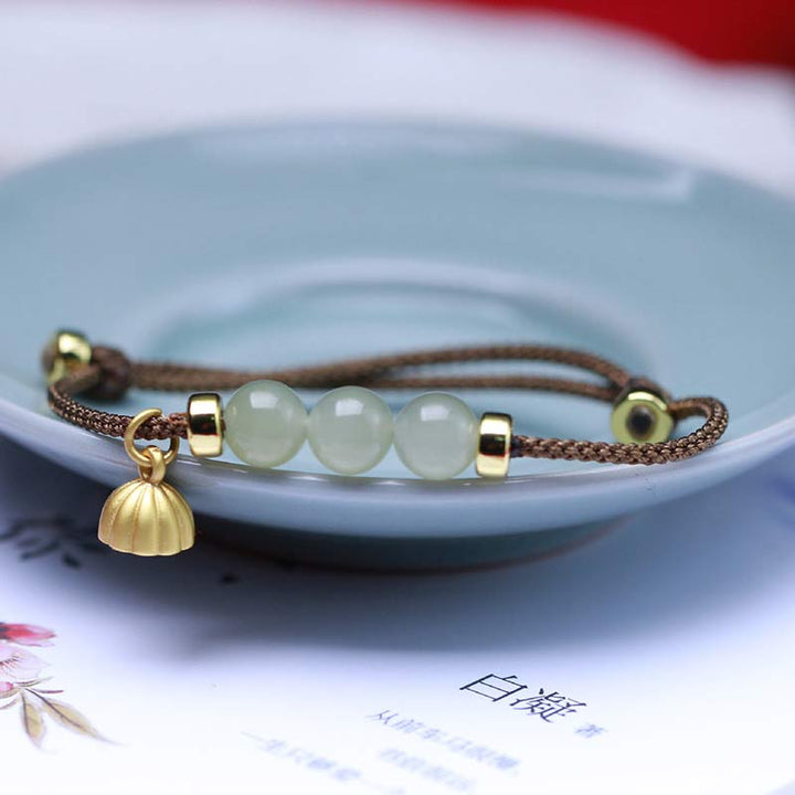 Bransoletka z naturalnego jadeitu i nasion lotosu z czerwonej nici Buddha Stones