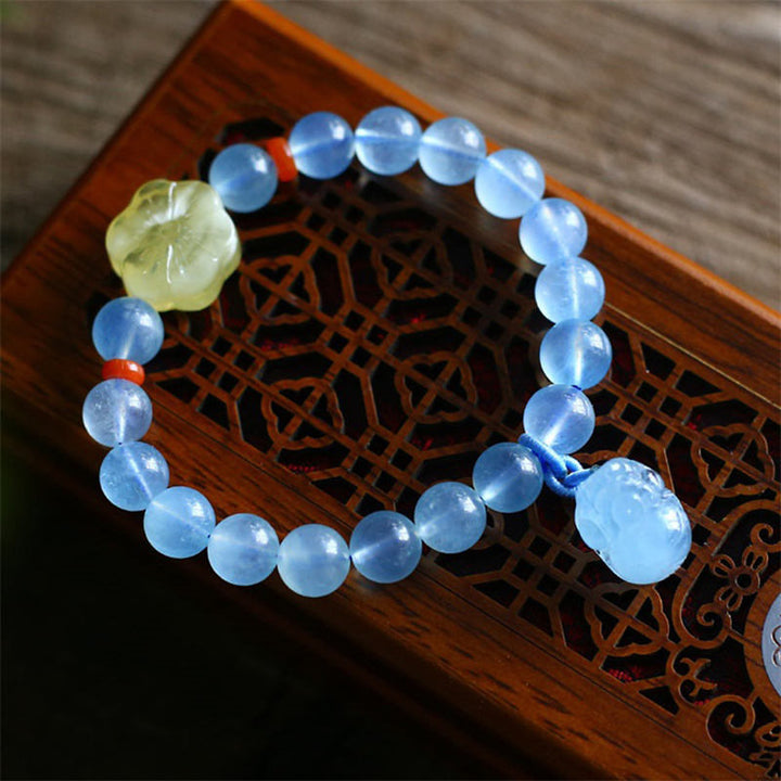 Bransoletka z naturalnego bursztynu i akwamarynu PiXiu Peace Healing Charm