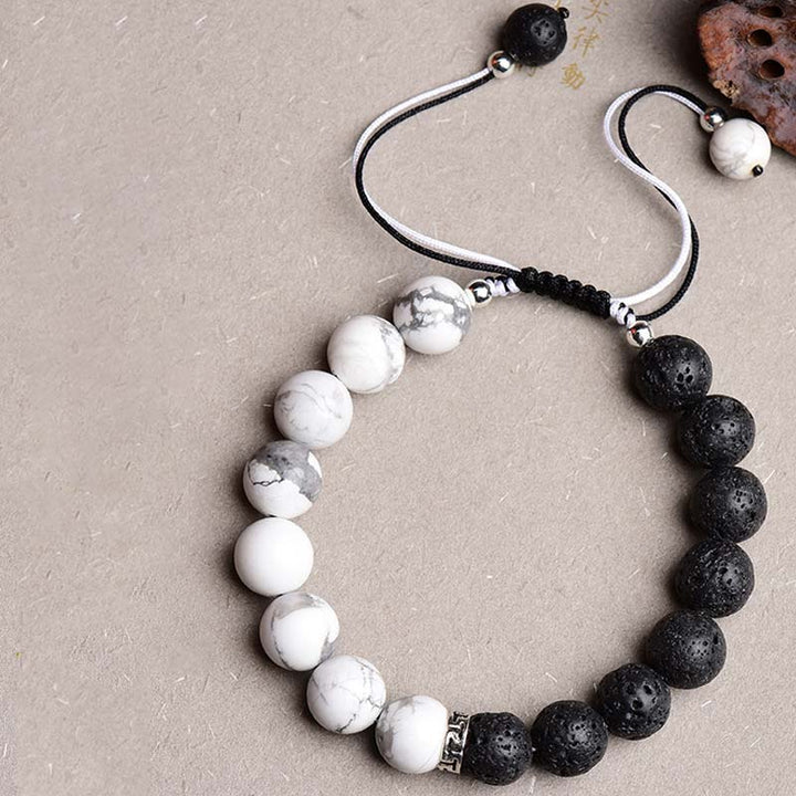 Bransoletka ochronna z kamieniami lawowymi Yin Yang Buddha Stones