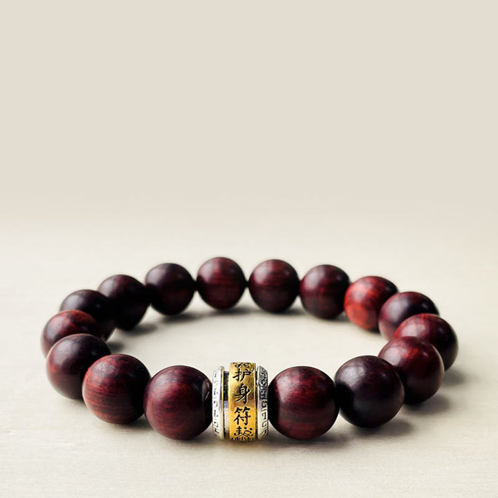 Bransoletka ochronna z amuletem z czerwonego drzewa sandałowego i Buddha Stones