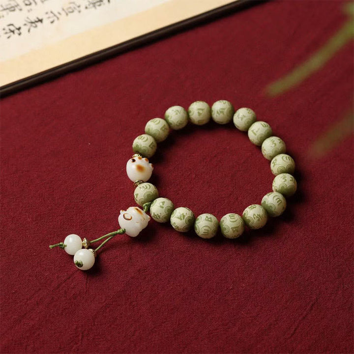 Buddha Stones Zielone Nasiona Bodhi Łapa Kota Om Mani Padme Hum Grawerowana Bransoletka Mądrości - Nasiono Bodhi (Pomyślność ♥ Szczęście) - image 1