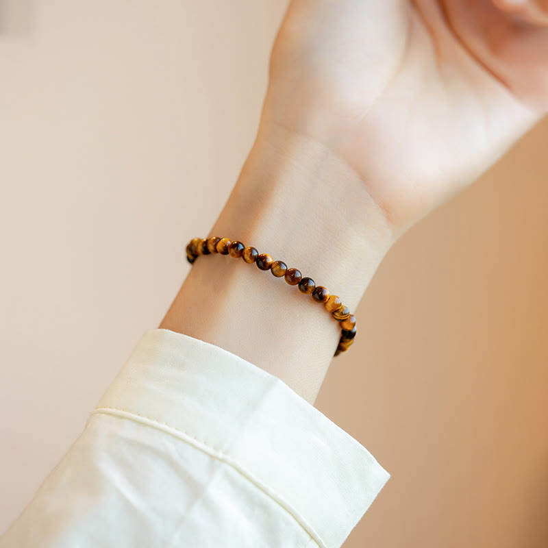 Bransoletka ochronna z Buddha Stones 14K pozłacane naturalne tygrysie oko z kamieniami odwagi
