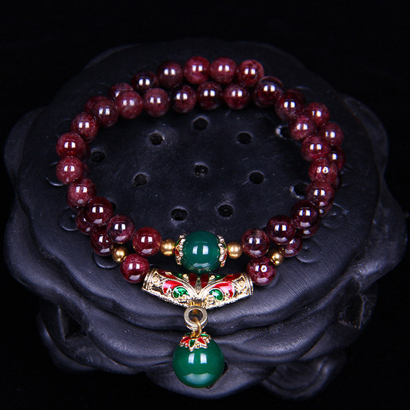 Bransoletka z naturalnego granatu i Buddha Stones