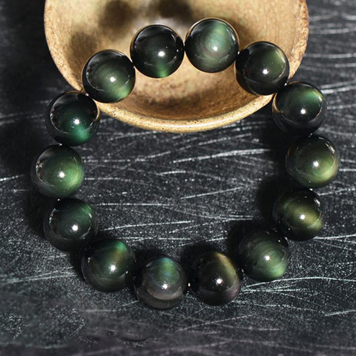Bransoletka z naturalnego zielonego oka obsydianu z Buddha Stones