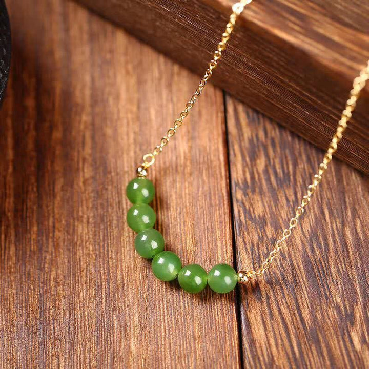 Naszyjnik z koralików Hetian Cyan Jade wykonany ze złota 14k