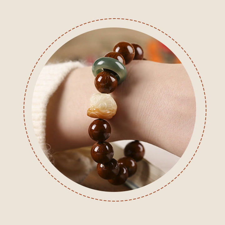 Bransoletka z Buddha Stones Fioletowe Nasiona Bodhi Tańczący Lew Mądrość