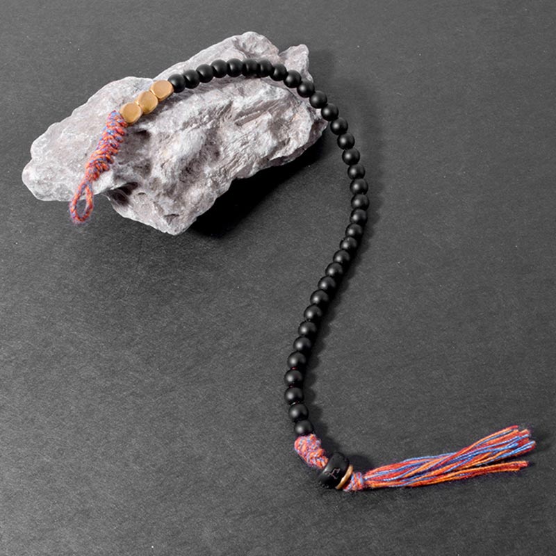 Bransoletka z frędzlami z Buddha Stones wykonana ręcznie z tybetańskiego czarnego onyksu