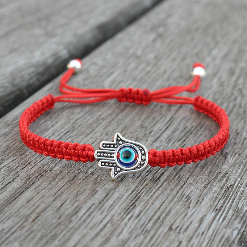 Bransoletka ze sznurka ochronnego z Buddha Stones , symbolem Hamsa, zapewniająca szczęście