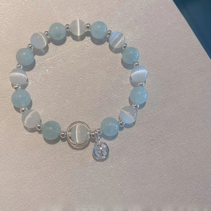 Bransoletka z zawieszkami Buddha Stones 925 ze srebra próby 925 z motywem kociego oka i akwamarynu