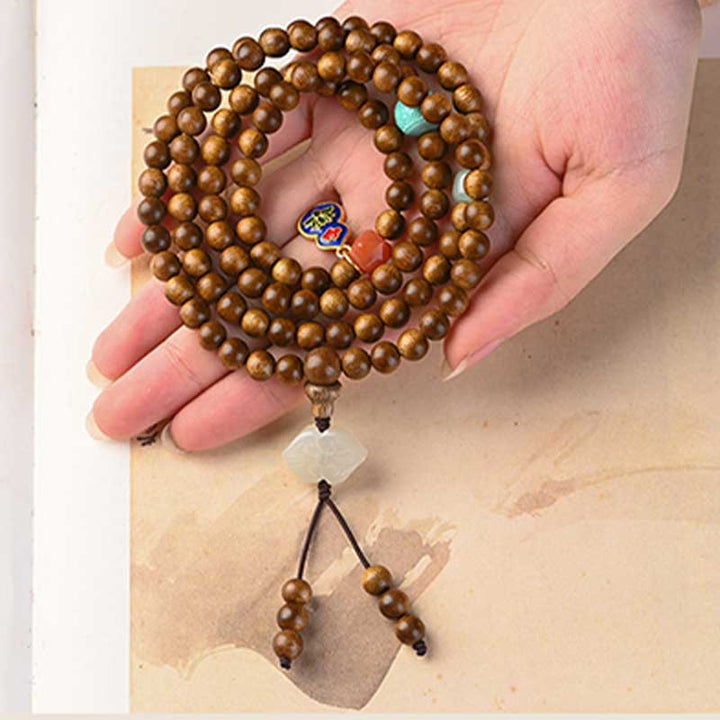 Bransoletka ochronna z palisandru tybetańskiego z Buddha Stones Mala