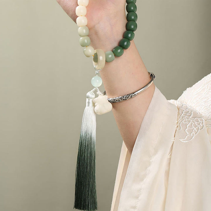 Buddha Stones Naturalny Gradient Bodhi Nasiona Fortuny Pieniądze Worek Lotos Mądrość Tassel Nadgarstek Mala