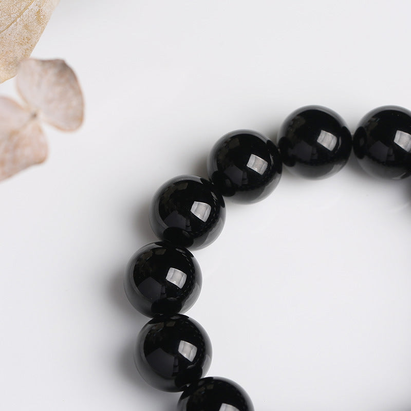 Bransoletka z naturalnego czarnego onyksu z Buddha Stones