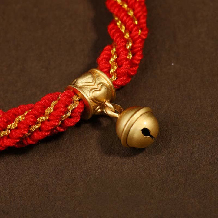 Tybetańska ręcznie robiona bransoletka z motywem dzwonka z motywem koła modlitewnego i zaplecionymi sznurkami