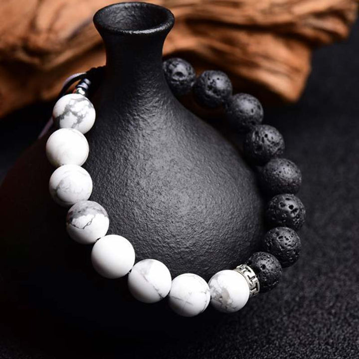 Bransoletka ochronna z kamieniami lawowymi Yin Yang Buddha Stones