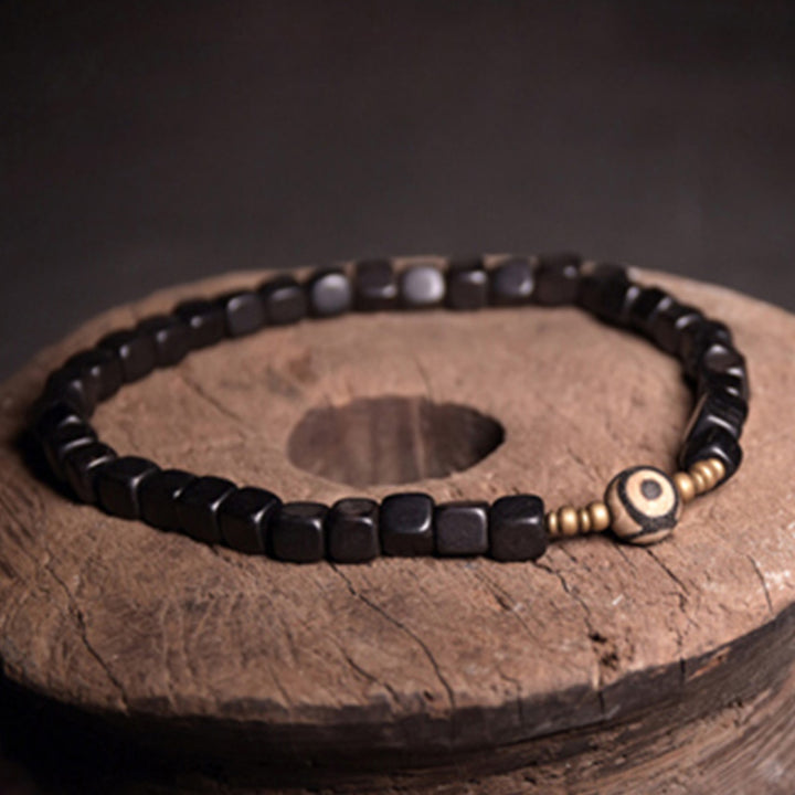 Bransoletka z koralików Ebony Wood Dzi Copper Peace Couple