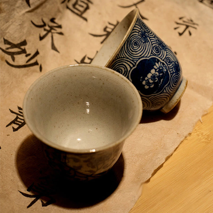 Buddha Stones Jingdezhen Niebiesko-biała porcelana Malowana ręcznie Lotos Kwiat Śliwki Ceramiczna filiżanka do herbaty Kung Fu Filiżanki do herbaty