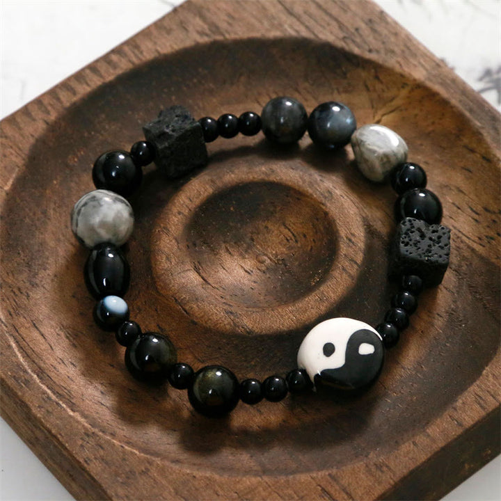 Bransoletka ochronna z Buddha Stones z czarnego onyksu i koralikami z jaspisu Picasso Yin Yang