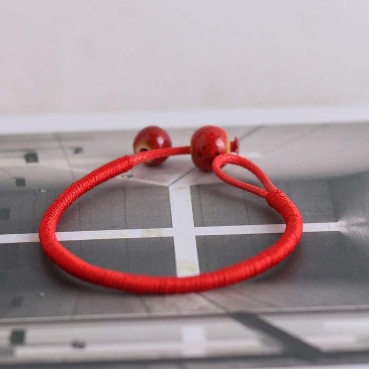Bransoletka ceramiczna z Buddha Stones FengShui Lucky Red String