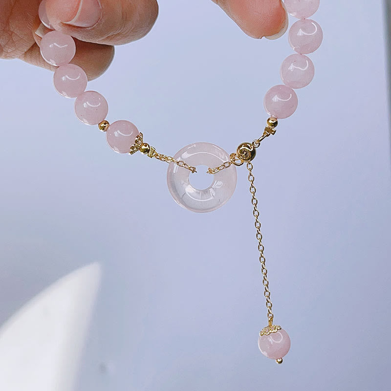 Bransoletka z naturalnego różowego kryształu Buddha Stones z klamrą i zawieszką Love Charm
