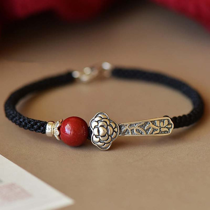 Bransoletka z Buddha Stones ze srebra próby 925 i sznurka błogosławieństwa z cynobrem