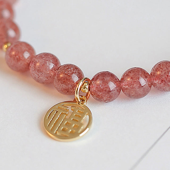 Bransoletka z Buddha Stones 14K pozłacana kwarcem truskawkowym Fu Character Healing Charm