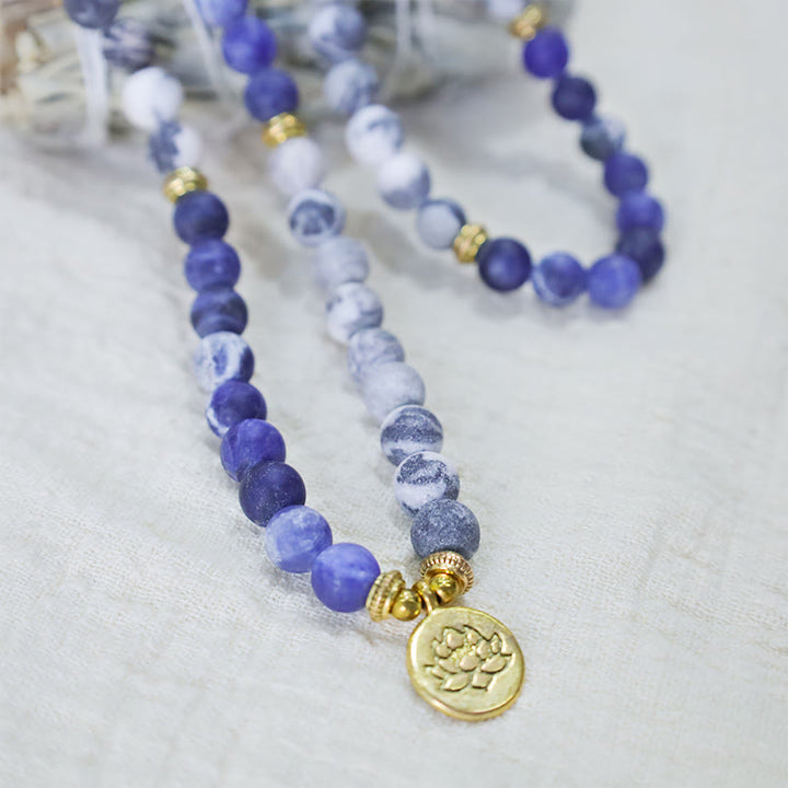 Buddha Stones Bransoletka z 108 naturalnych jaspisów Picasso i niebieskich kamieni Mala Bead Lotus