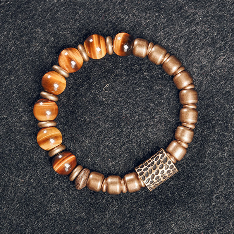 Bransoletka ochronna z Buddha Stones, kamieniami tygrysimi i miedzią