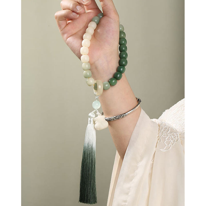 Buddha Stones Naturalny Gradient Bodhi Nasiona Fortuny Pieniądze Worek Lotos Mądrość Tassel Nadgarstek Mala