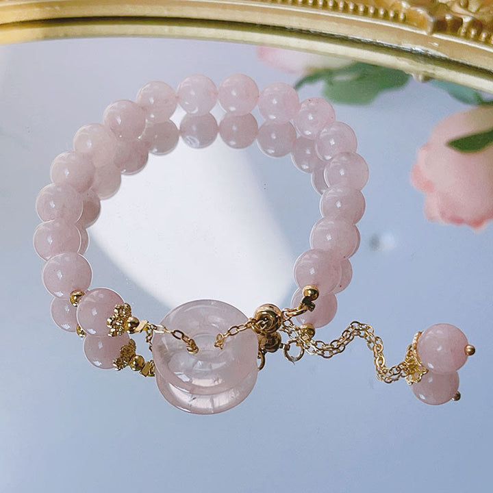 Bransoletka z naturalnego różowego kryształu Buddha Stones z klamrą i zawieszką Love Charm
