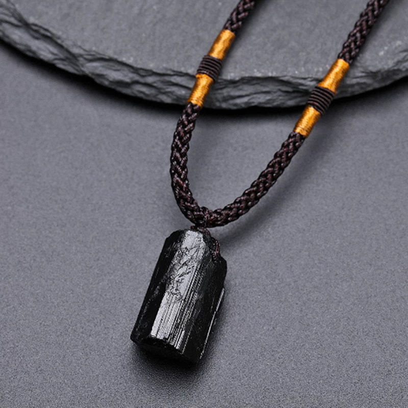 Naszyjnik z wisiorkiem z naturalnego czarnego turmalinu i pozytywnej liny Buddha Stones - Czarny turmalin (surowa, wydłużona forma · rozmiar różny) - image 0