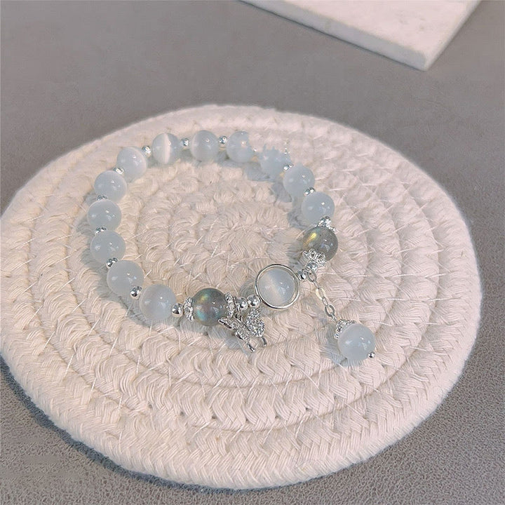 Bransoletka wspierająca z Buddha Stones, kocim okiem i kamieniem księżycowym, motylem i gwiazdą