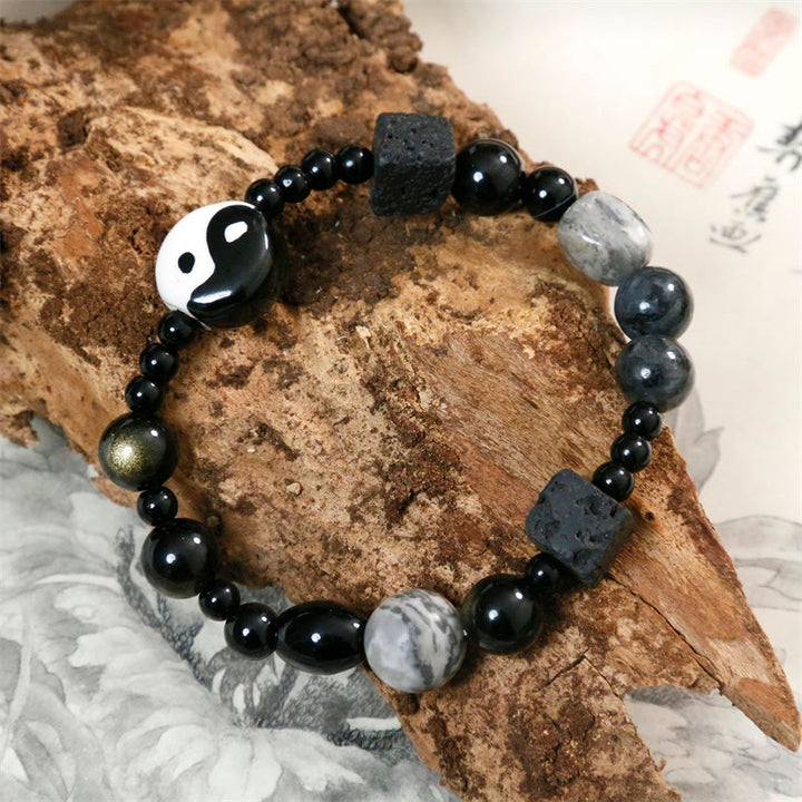 Bransoletka ochronna z Buddha Stones z czarnego onyksu i koralikami z jaspisu Picasso Yin Yang