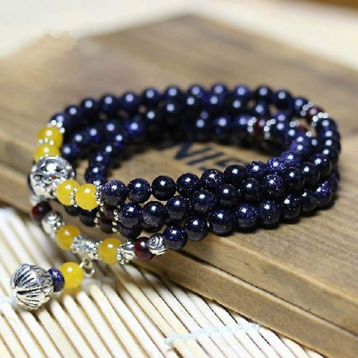 Bransoletka z zawieszkami bogactwa z niebieskiego piaskowca i Buddha Stones Mala