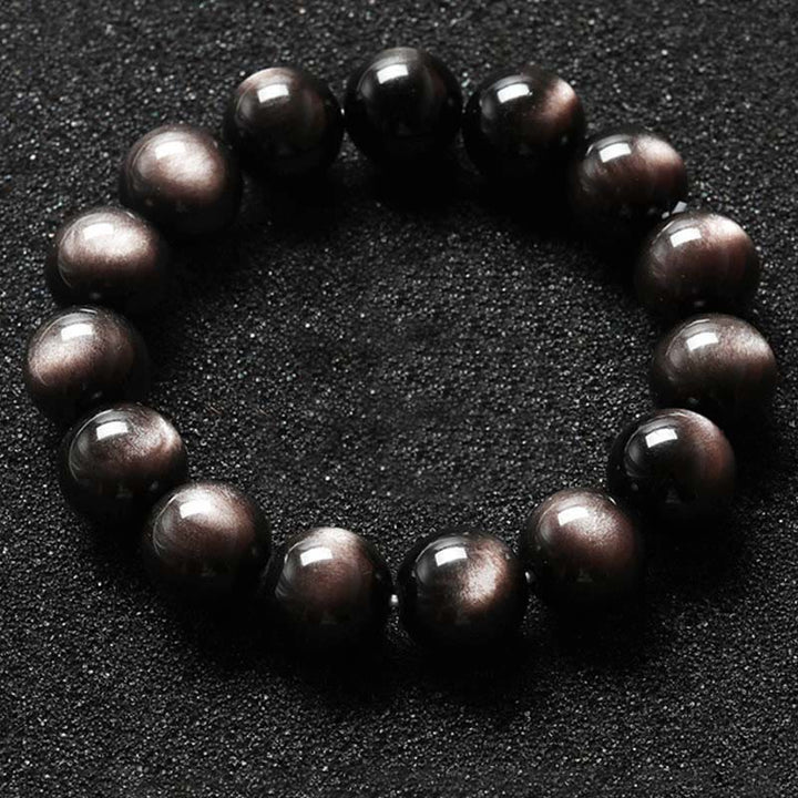 Bransoletka ochronna z naturalnego obsydianu i Buddha Stones w kolorze srebra