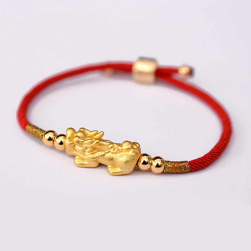Bransoletka z czerwonego sznurka PiXiu Luck z Buddha Stones 24K pozłacana