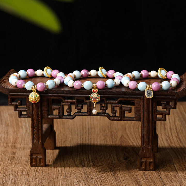 Buddha Stones Tybetańskie Zakiram Bogini Bogactwa Królik Głowa Lwa Charm Liuli Szkło Kadzidło Popiół Porcelanowa Koralik Ochrona Bransoletka