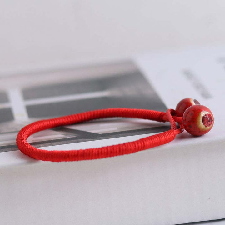 Bransoletka ceramiczna z Buddha Stones FengShui Lucky Red String
