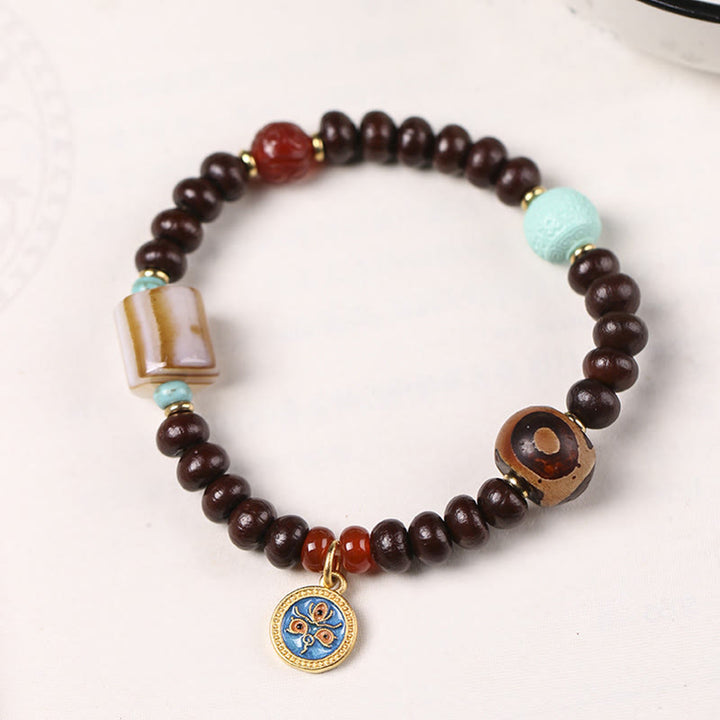 Buddha Stones Naturalne Tybetańskie Fioletowe Nasiona Bodhi Dzi Koraliki Bóg Bogactwa Mądrość Bransoletka