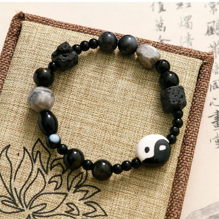 Bransoletka ochronna z Buddha Stones z czarnego onyksu i koralikami z jaspisu Picasso Yin Yang