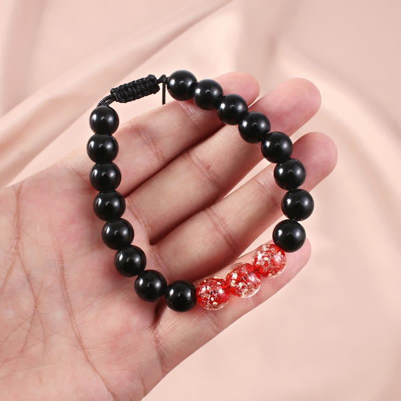 Bransoletka Buddha Stones Black Obsidian Luminous Glowstone Strength