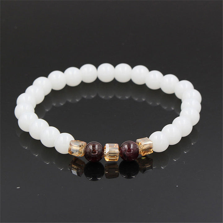 Bransoletka ochronna z naturalnego białego jadeitu z Buddha Stones