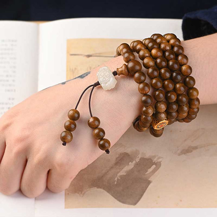 Bransoletka ochronna z palisandru tybetańskiego z Buddha Stones Mala