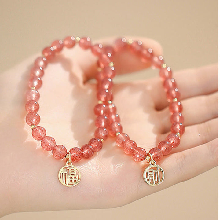 Bransoletka z Buddha Stones 14K pozłacana kwarcem truskawkowym Fu Character Healing Charm