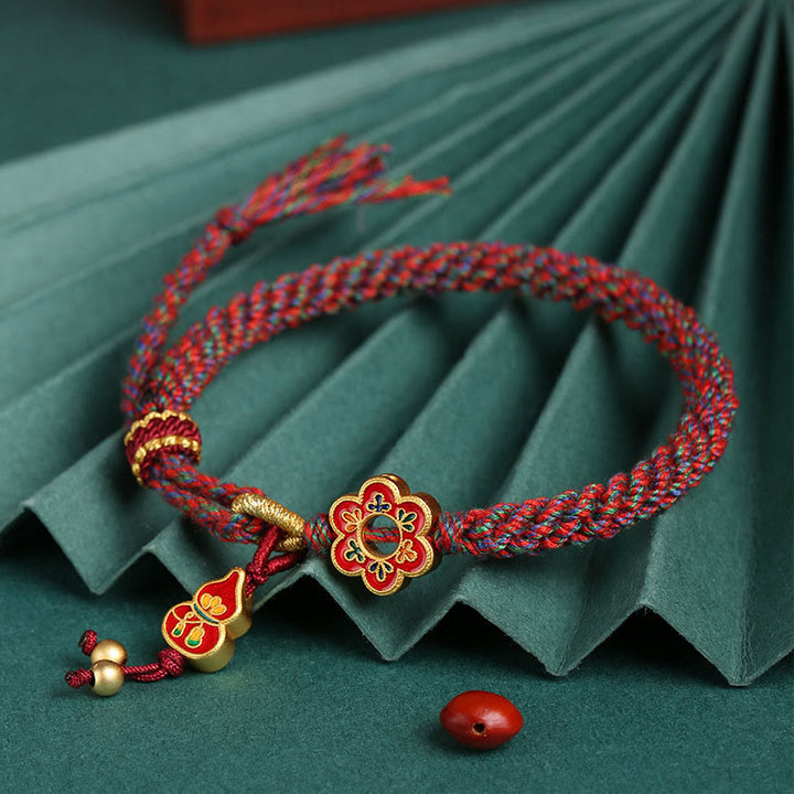 Bransoletka z plecionego sznurka z ręcznie robionymi kolorowymi kwiatami z Buddha Stones